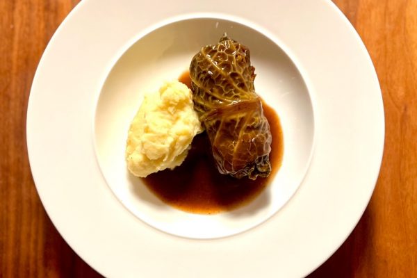 Savoy cabbage rolls in braising sauce